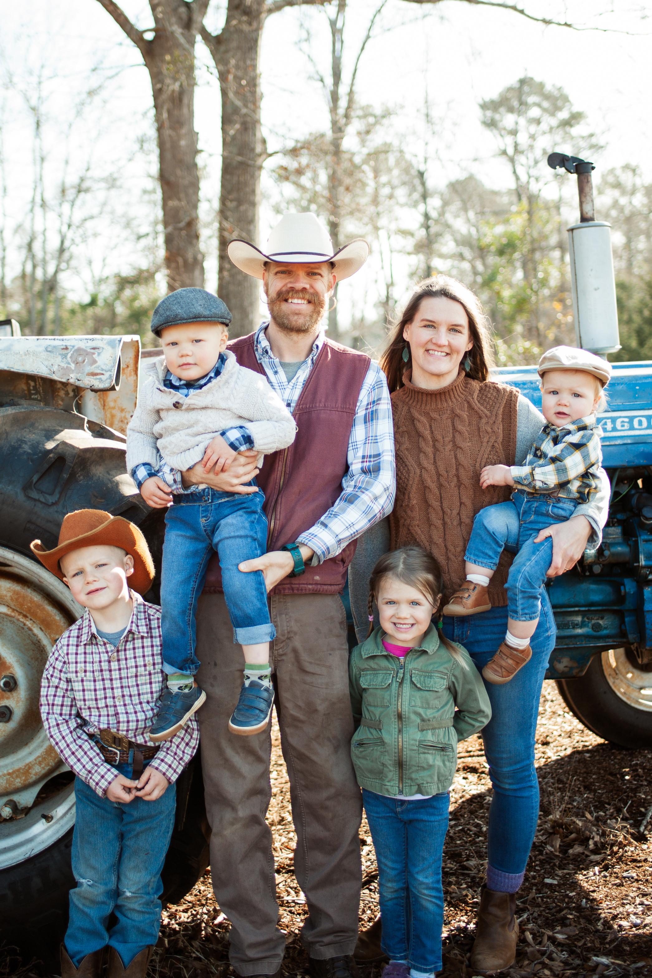 We Cut Acres family after a land clearing and tree service job in Middle Georgia