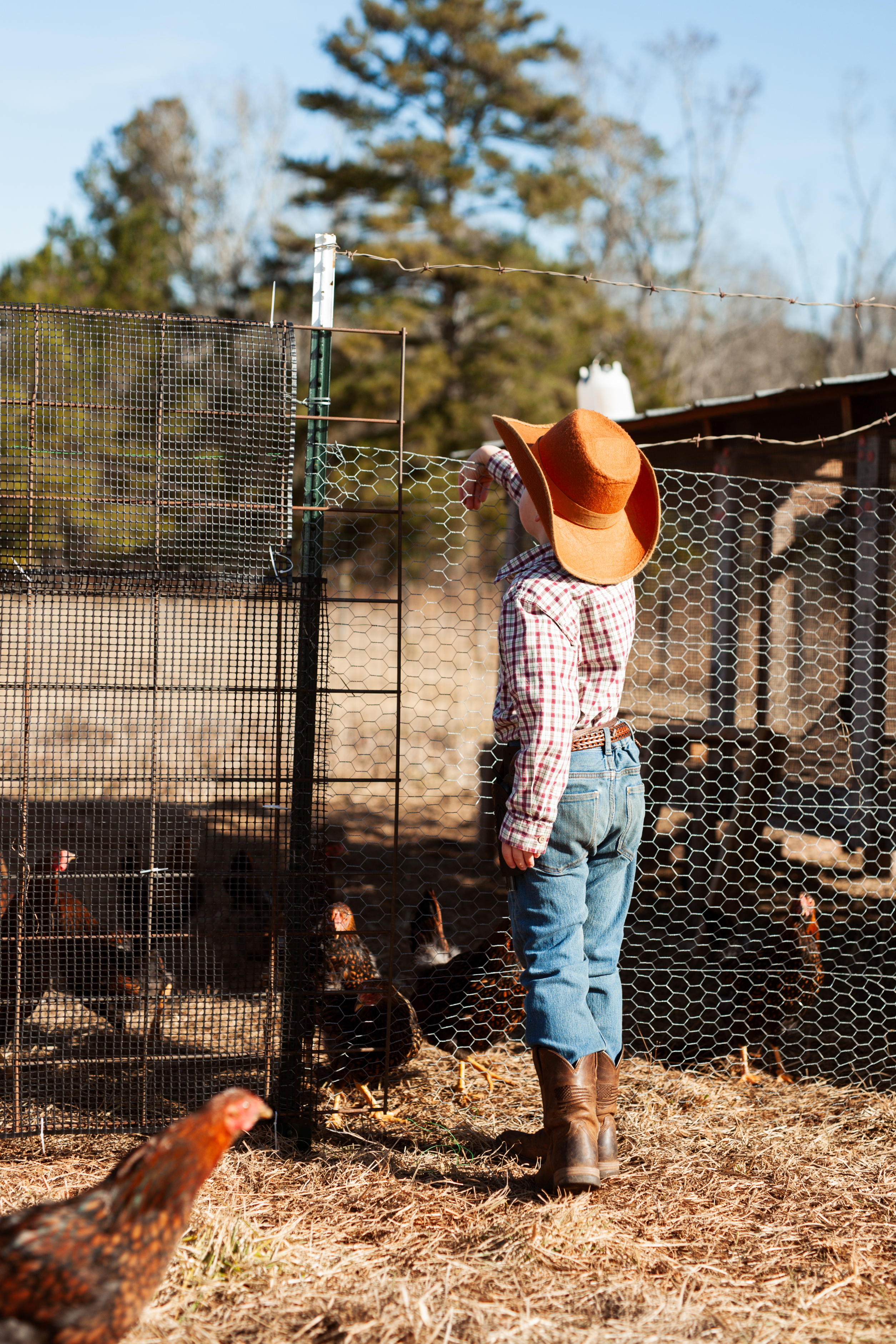 Wesley with family on a Middle Georgia property served by We Cut Acres